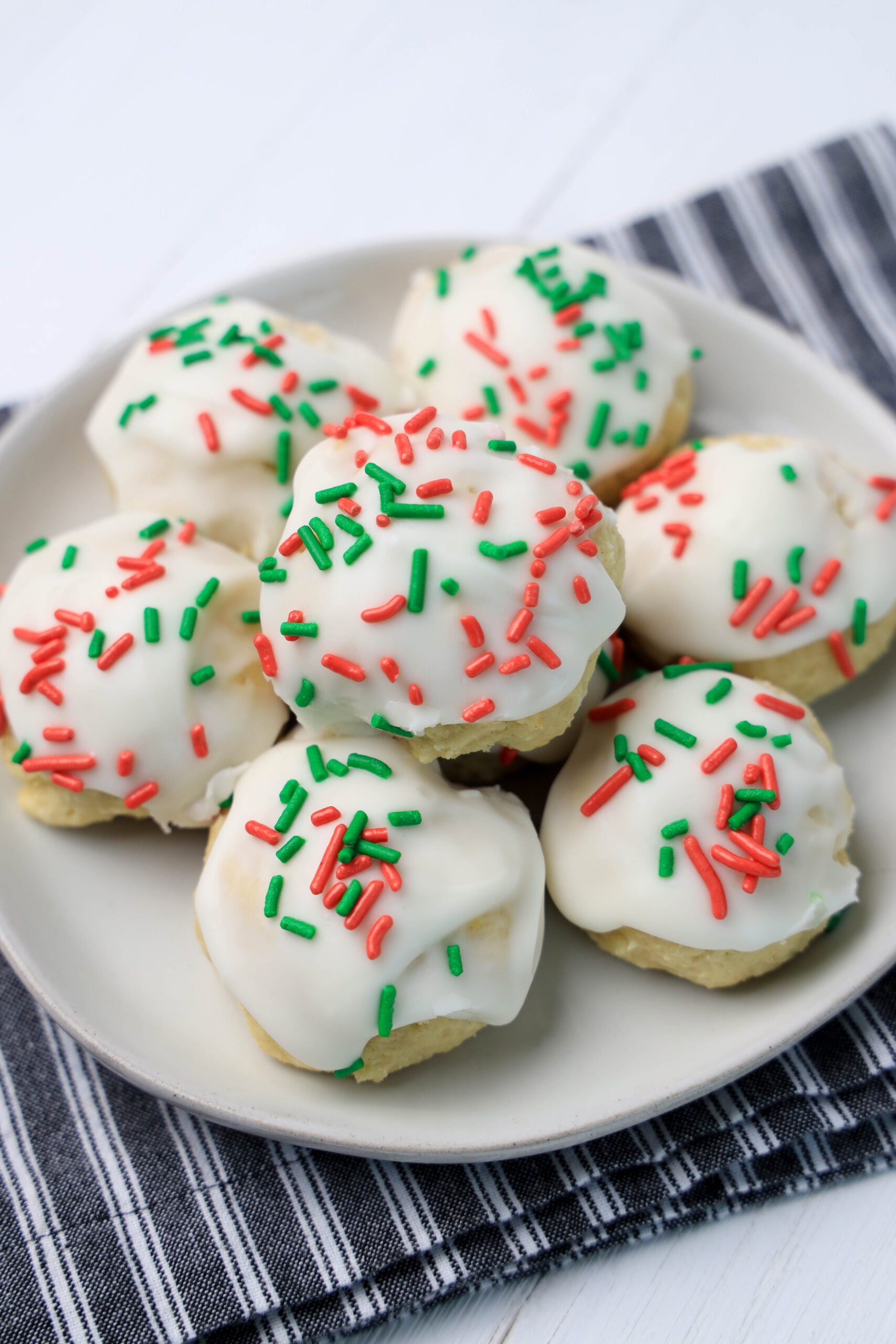 cookies with sprinkles in white plate