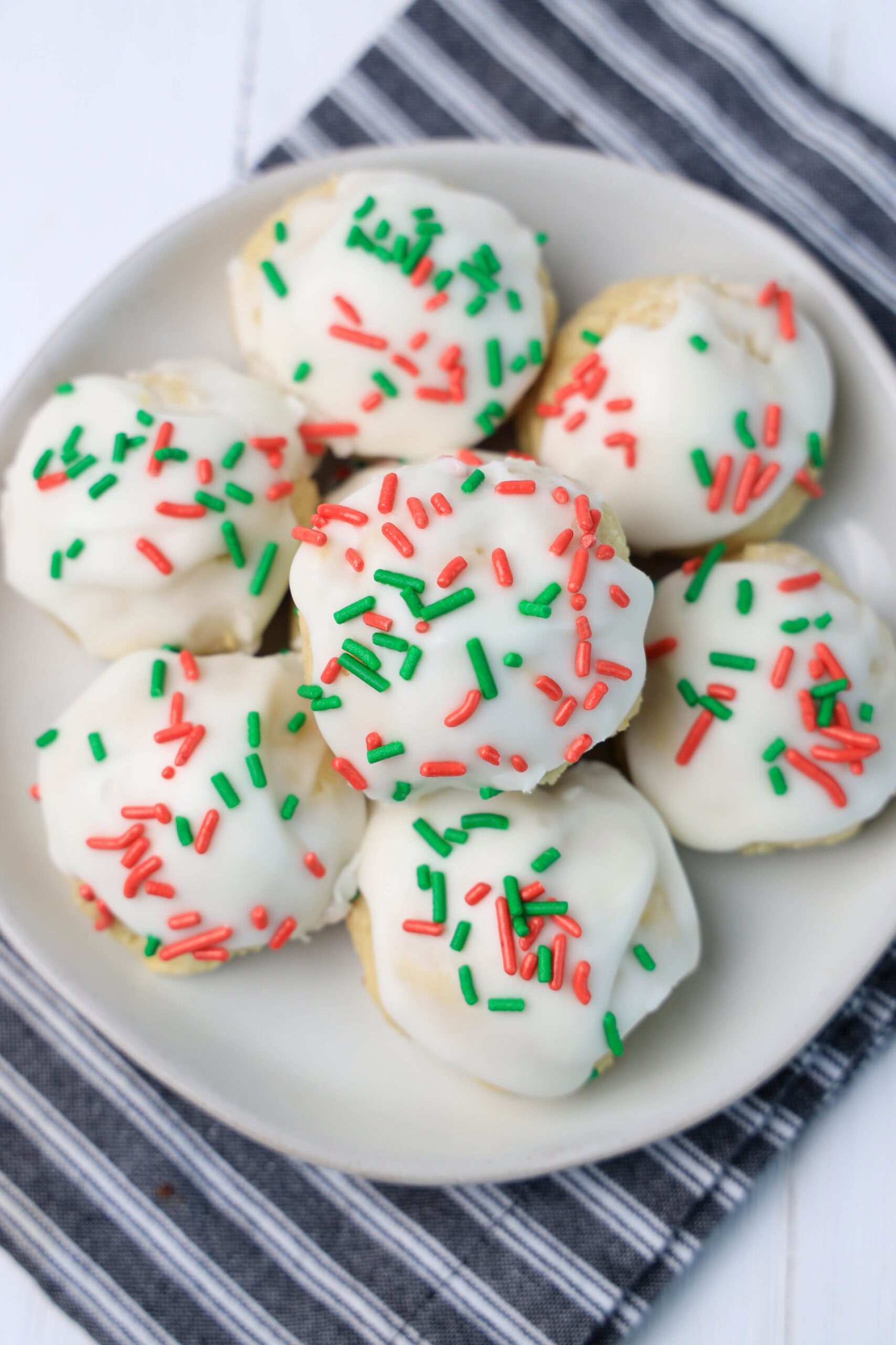 cookies topped with red and green sprinkles