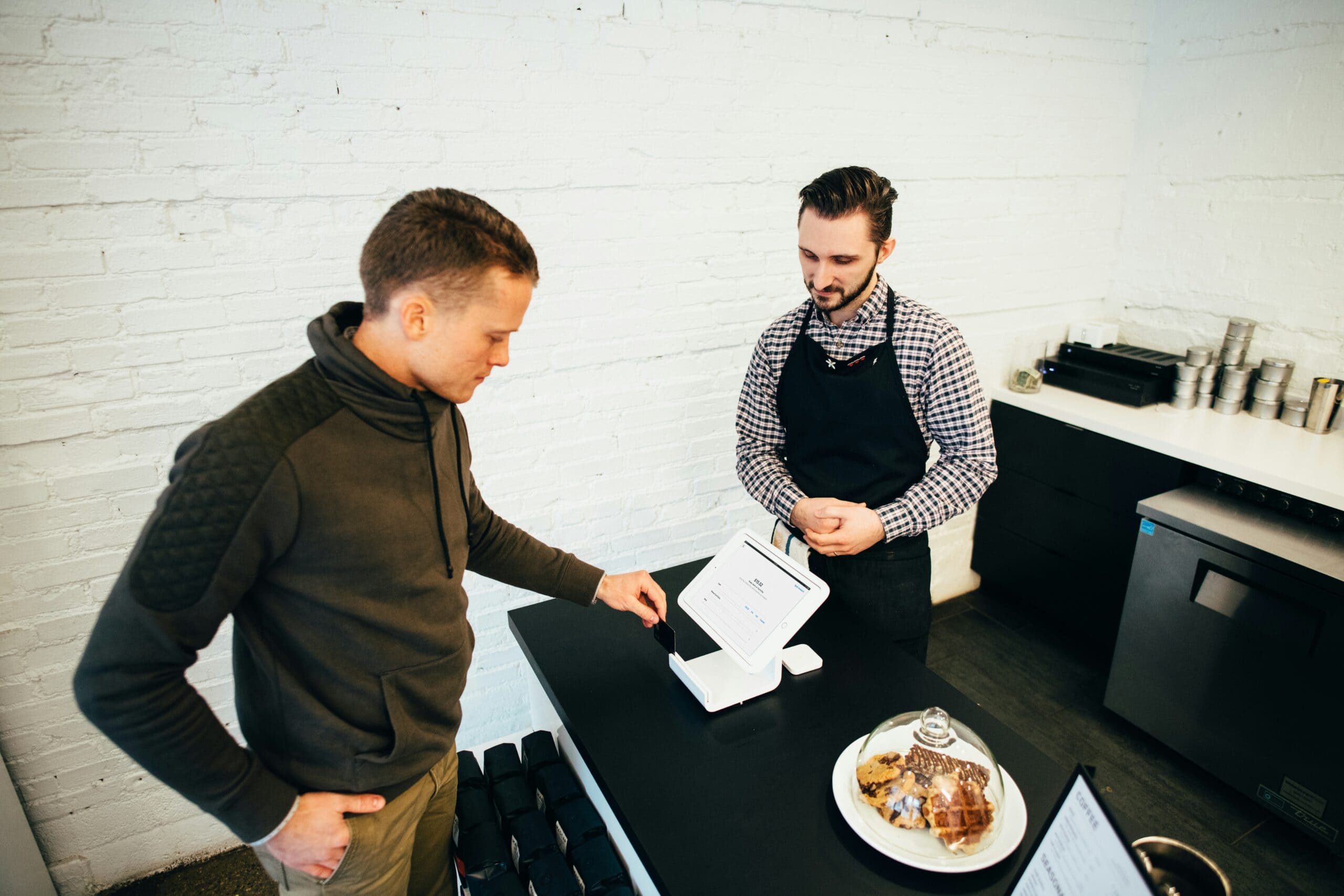 guy tipping off at a restaurant counter