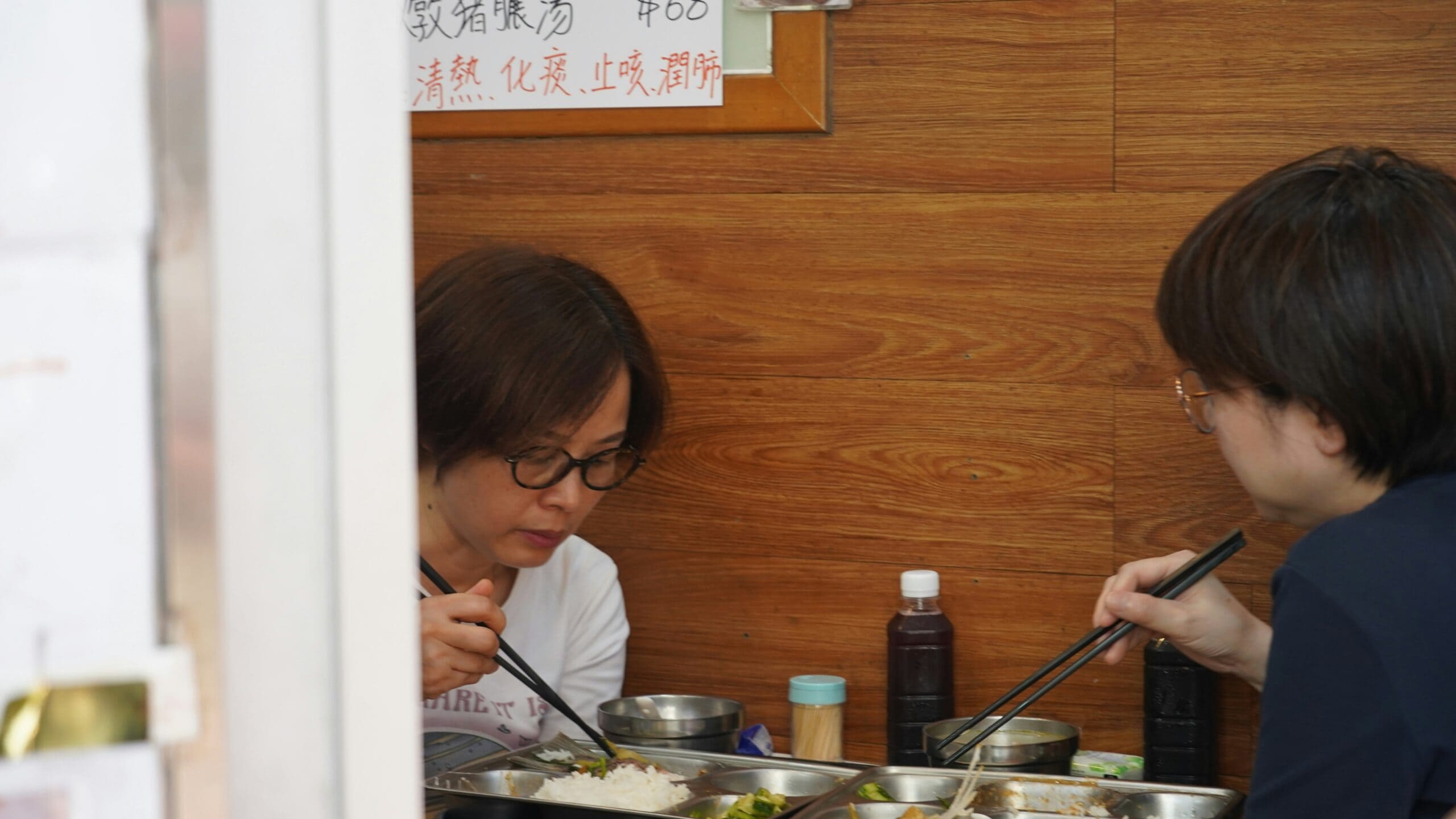 Two people eating at a resto