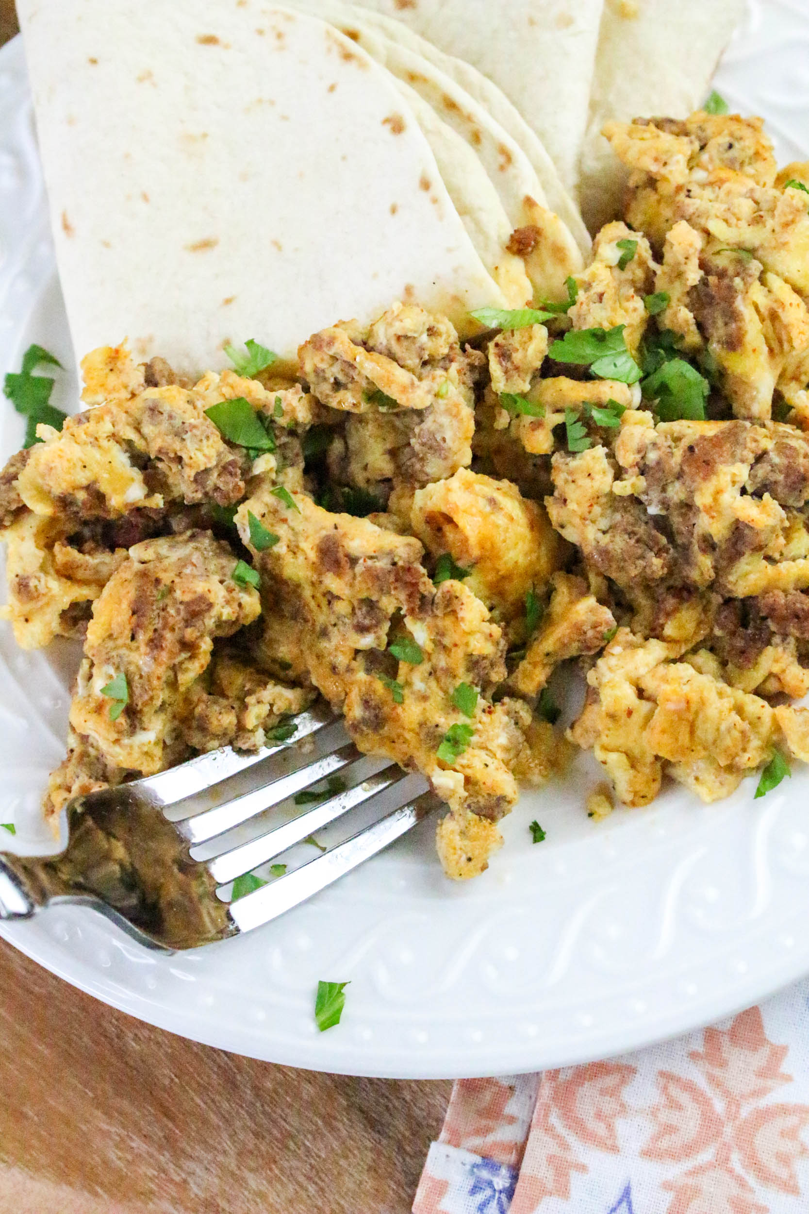 Chorizo and Eggs with fork on the side