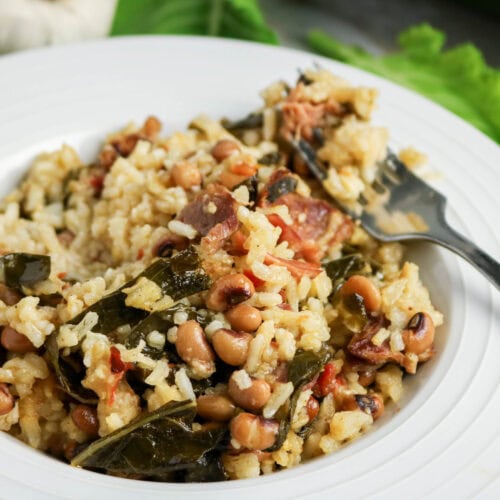Slow Cooker Black Eyed Peas Collards and Rice in a plate focused on camera