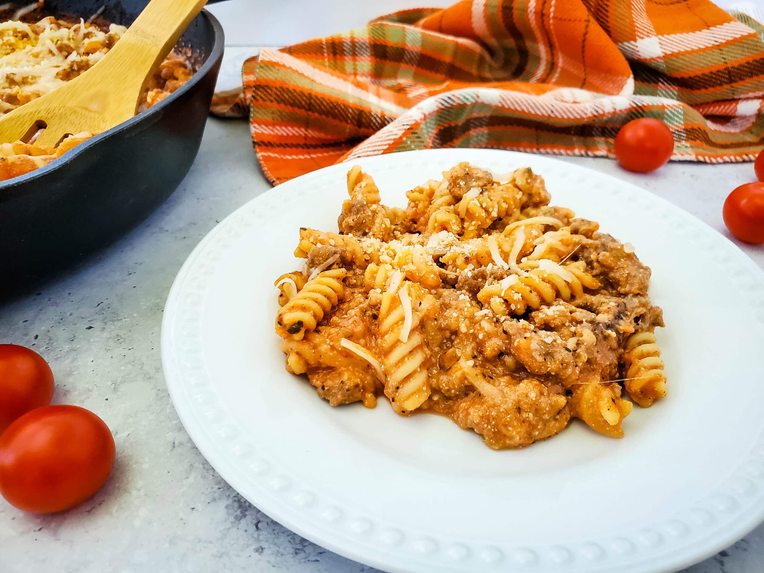 pasta on plate with red cothing