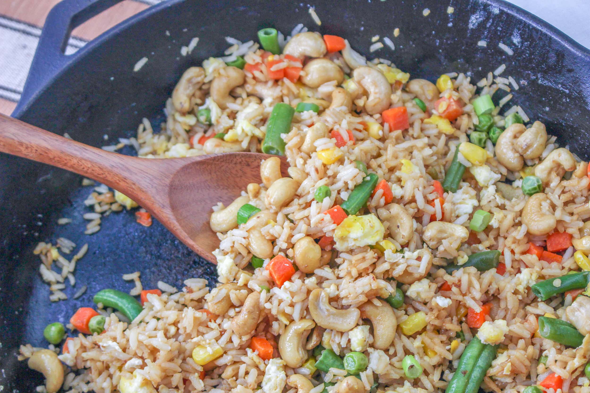 Cashew Fried Rice being stirred