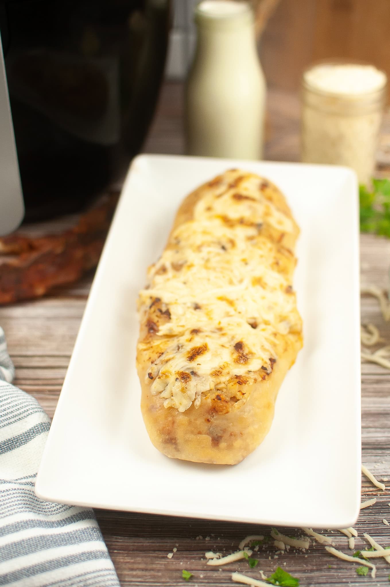 Copycat Costco Chicken Bake in a white rectangular plate