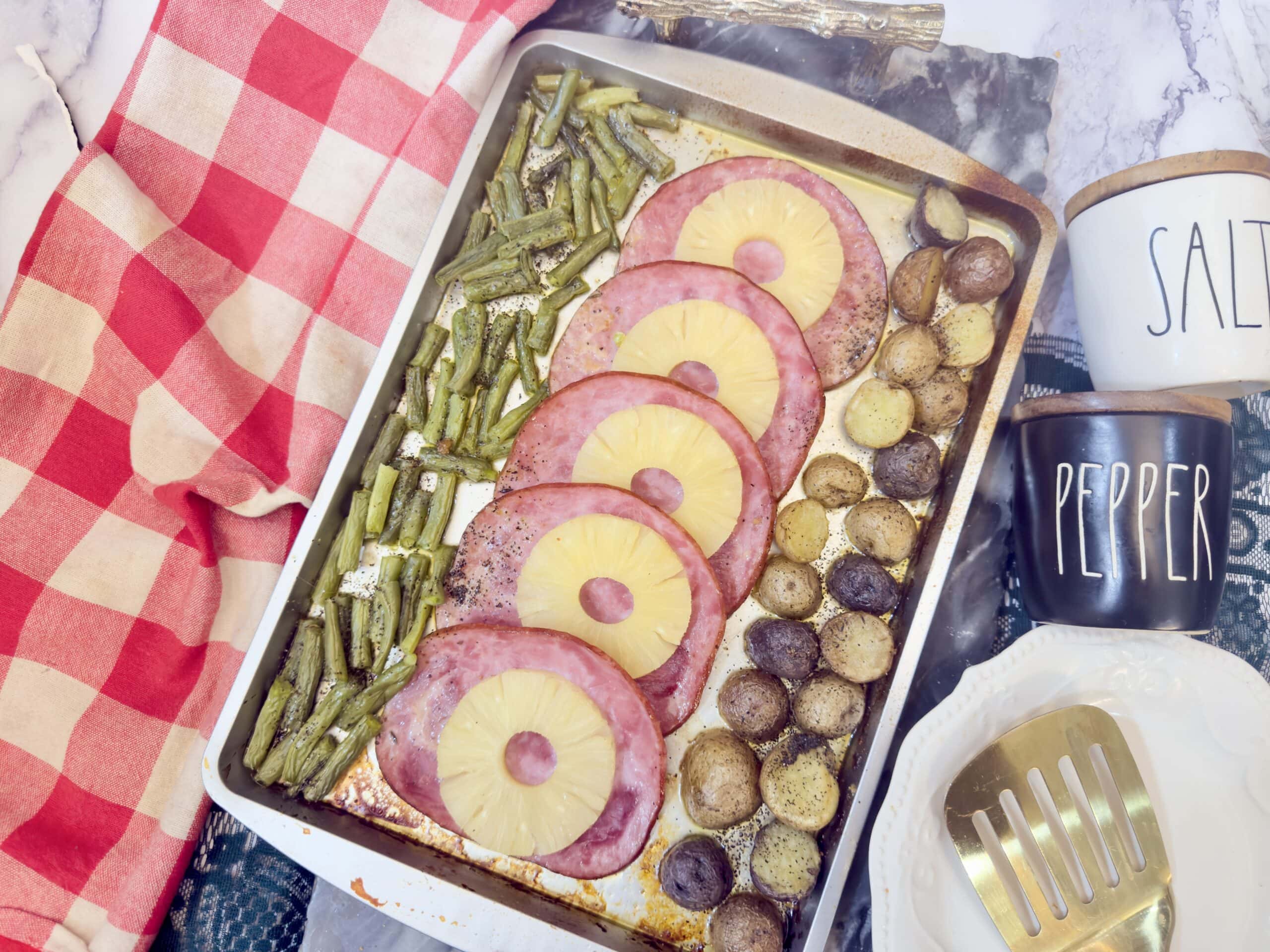 Sheet Pan Ham Dinner on red table cloth